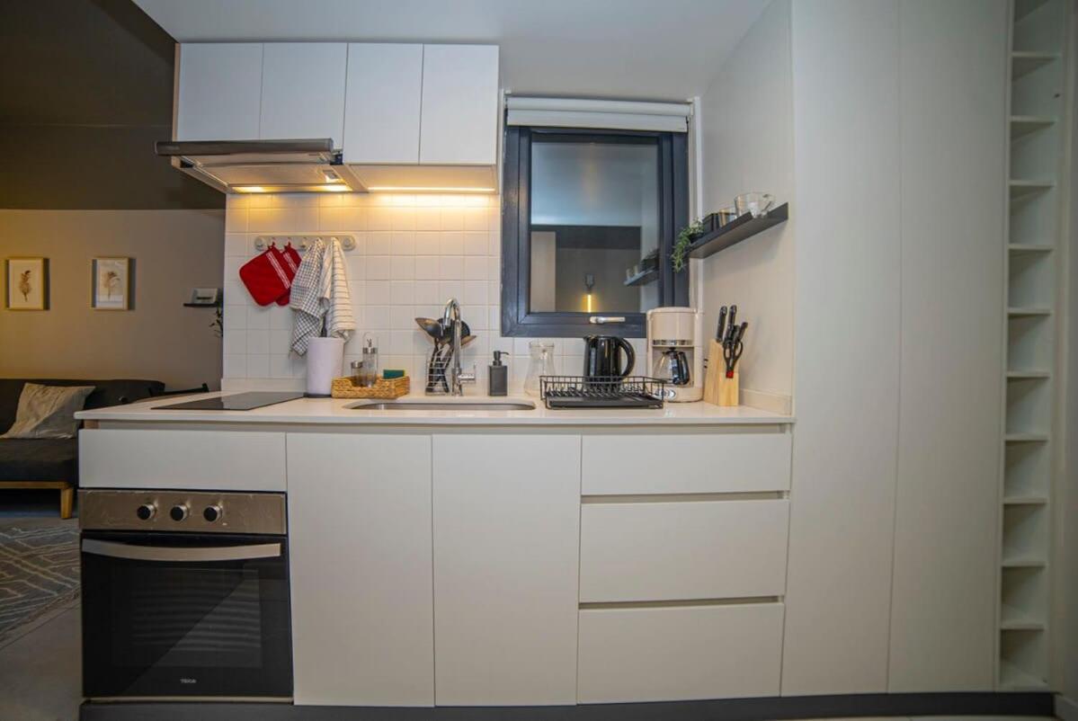 With Private Terrace Steps From Metro
